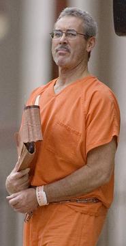 allen-stanford-prison-coveralls.jpg