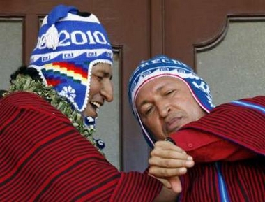 Chavecito and Evo in Andean flap hats