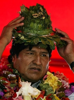 Evo models a coca-leaf hat