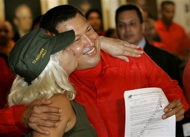 Hugo Chavez with activist Lina Ron