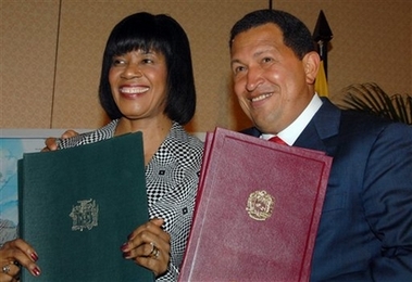 Hugo Chavez with Jamaican PM Portia Simpson Miller
